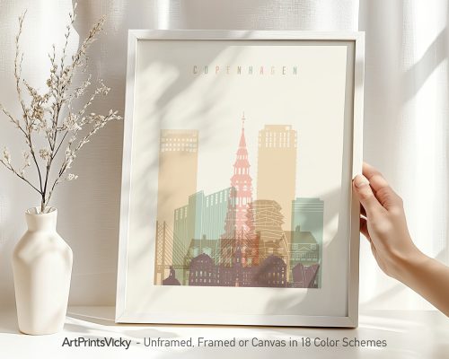 Art print featuring a stylized cityscape of Copenhagen with buildings and a tower in soft colors.