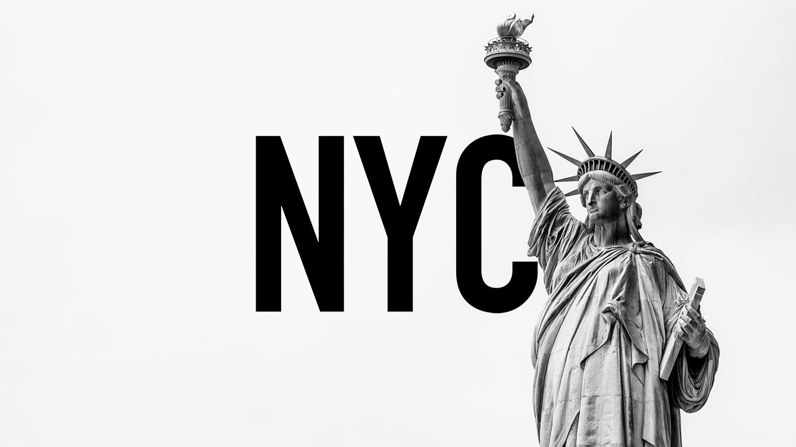 Black and white image of the Statue of Liberty with the text 'NYC' in bold letters.