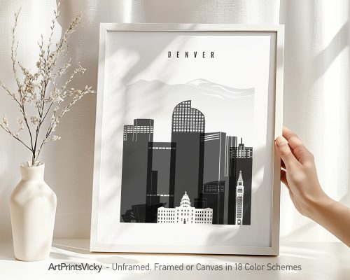 Framed artwork featuring a black and white cityscape of Denver with the word 'DENVER' at the top.
