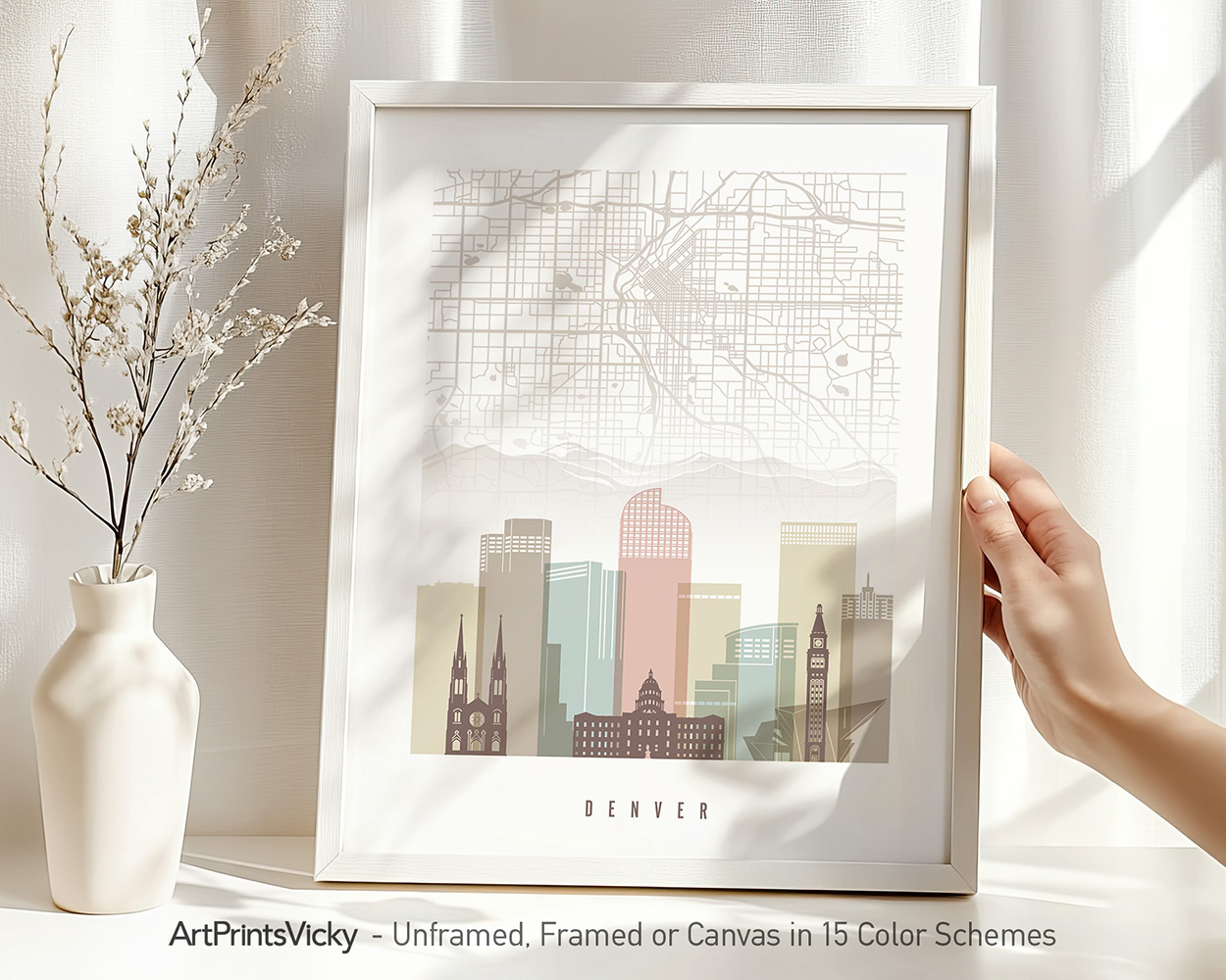 Framed map print of Denver featuring key buildings and a grid layout.