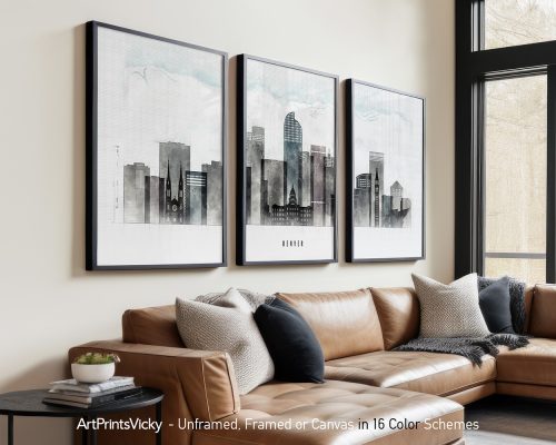 Three framed art prints depicting a cityscape of Denver with buildings and skyline.