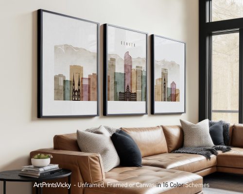 Three framed art prints of Denver cityscape with buildings and mountains in soft colors.