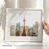 Art print of Düsseldorf skyline featuring buildings and a tower in a minimalist style.