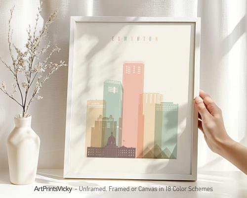 Art print of the Edmonton city skyline featuring various building shapes and colors in a framed display.