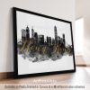 Framed artwork of the Hong Kong skyline with a watercolor effect and gold lettering.