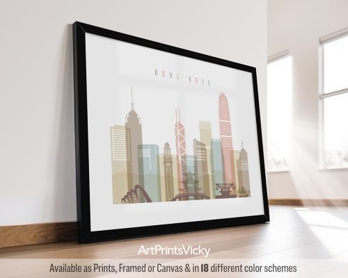Framed artwork depicting a stylized skyline of Hong Kong with various buildings.