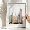 Art print of a stylized cityscape featuring Hong Kong's skyline in muted colors.