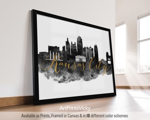 Framed artwork depicting the skyline of Kansas City with a black and gold color scheme.