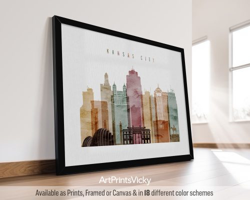 Framed artwork featuring a stylized cityscape of Kansas City with various buildings and colors.