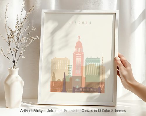Art print of the Lincoln city skyline featuring various building silhouettes in pastel colors.
