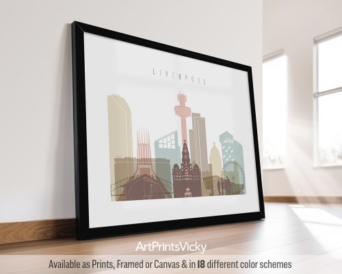 Framed artwork featuring a stylized cityscape of Liverpool with notable landmarks.