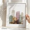 Art print of the Milwaukee city skyline featuring various buildings in muted colors.
