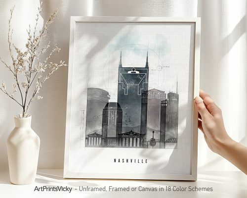Framed artwork depicting a cityscape of Nashville with various buildings and a geometric design.
