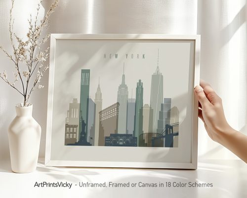 Framed artwork depicting the skyline of New York City with various iconic buildings.