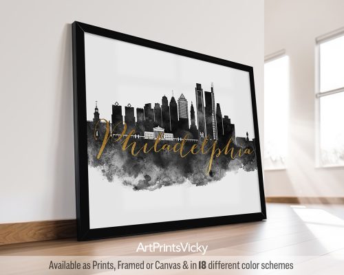 Art print featuring a silhouette of Philadelphia's skyline with the word 'Philadelphia' in gold lettering.