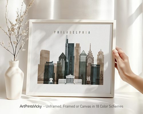 Framed artwork depicting a cityscape of Philadelphia with notable buildings and structures.