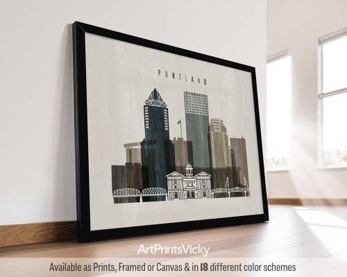 Framed artwork depicting a stylized cityscape of Portland with notable buildings.