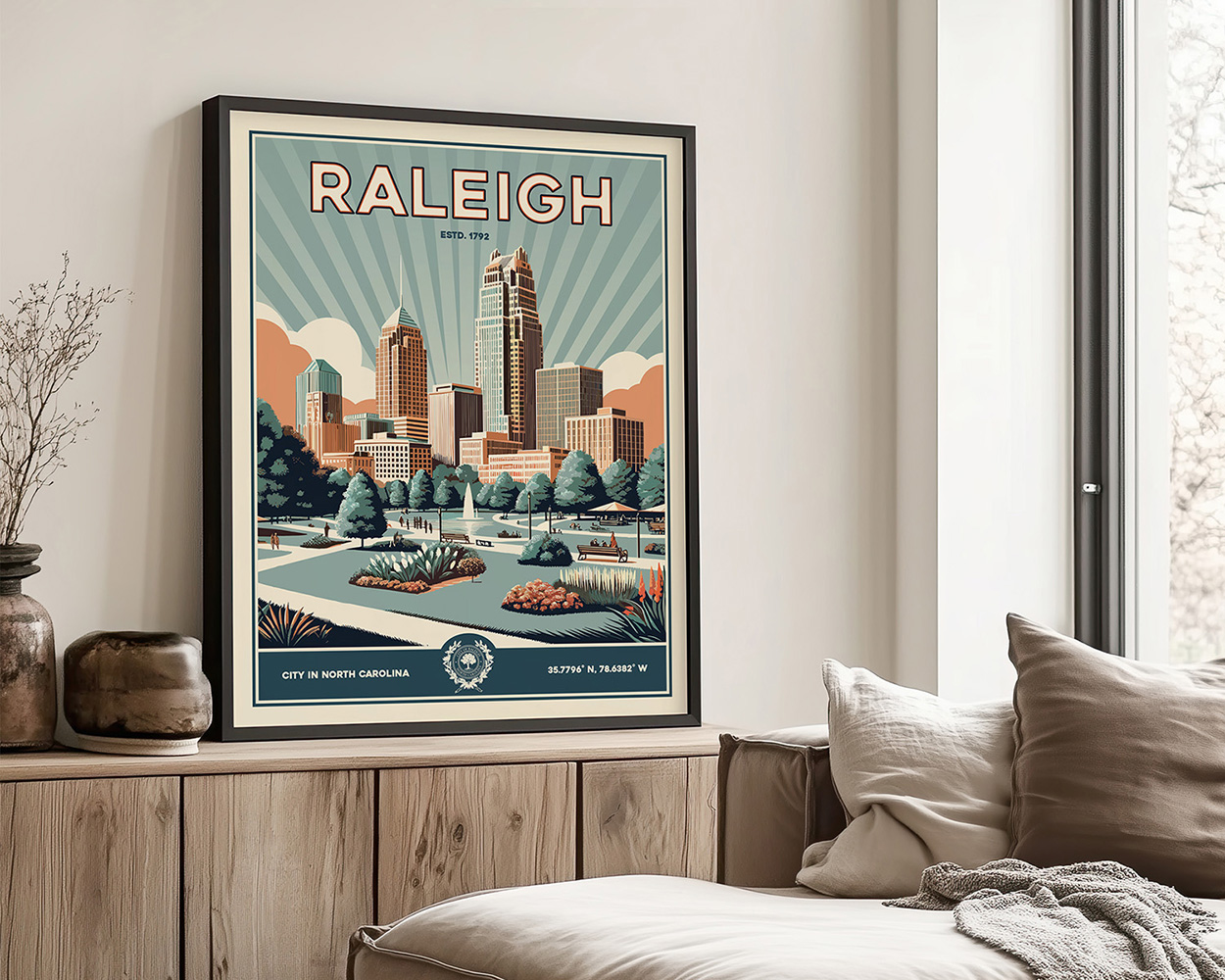 Framed poster of Raleigh, North Carolina, featuring city skyline and stylized graphics.