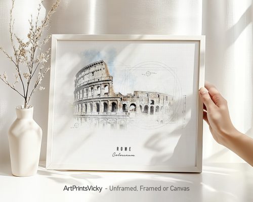 Art print of the Colosseum in Rome displayed in a white frame with a hand holding it.