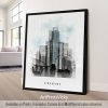 Framed artwork depicting a cityscape of Singapore with modern buildings and a watercolor effect.