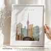Art print featuring a stylized illustration of Stuttgart's skyline with various buildings and structures.