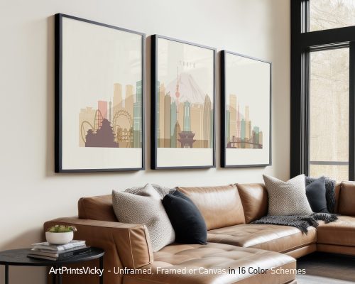 Three framed art prints depicting a stylized Tokyo cityscape with Mount Fuji and urban elements.