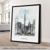 Framed artwork depicting a cityscape of Toronto with the CN Tower and skyscrapers in a watercolor style.