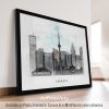 Framed artwork of Toronto skyline featuring the CN Tower and various buildings.