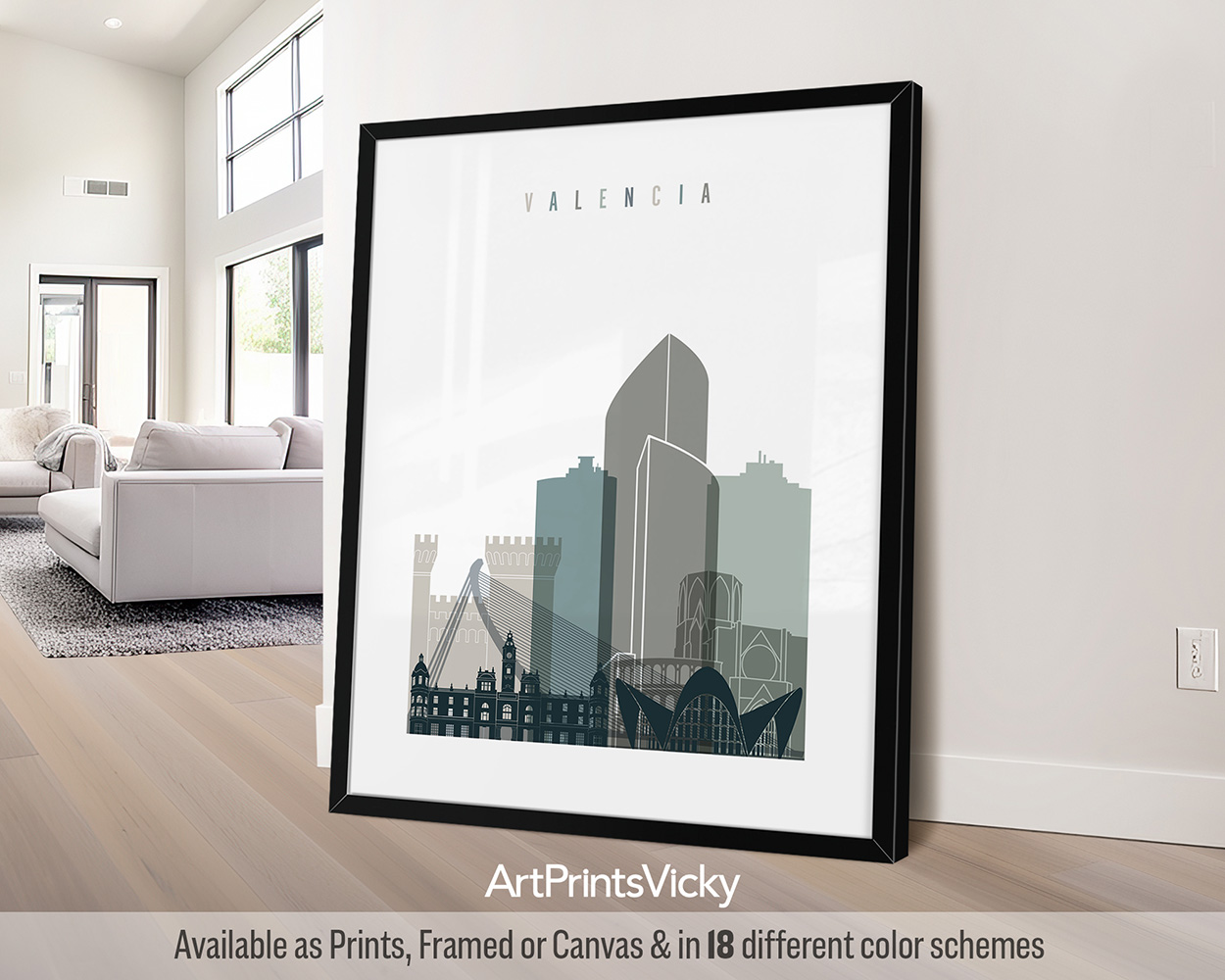 Framed artwork featuring a stylized cityscape of Valencia with notable buildings.