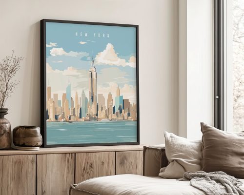 Framed artwork depicting the New York City skyline with the Empire State Building and clouds.