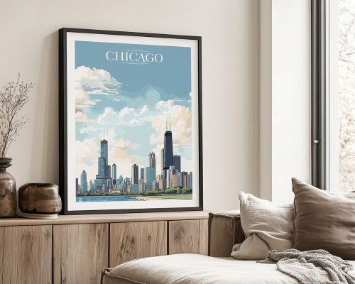 Framed artwork of the Chicago skyline featuring prominent buildings and a blue sky with clouds.