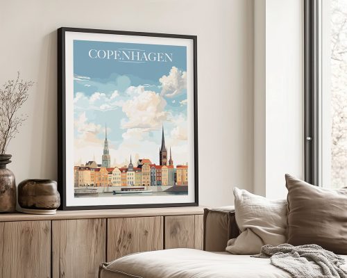 Framed art print of a Copenhagen cityscape featuring buildings and clouds.