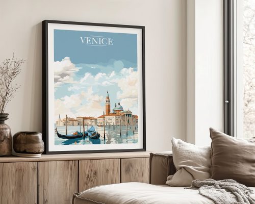 Framed artwork depicting a scenic view of Venice with boats and buildings under a blue sky.