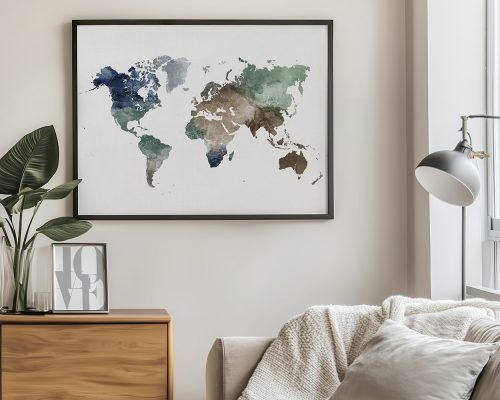 Watercolor world map featuring various shades of blue, green, and brown in a framed display.