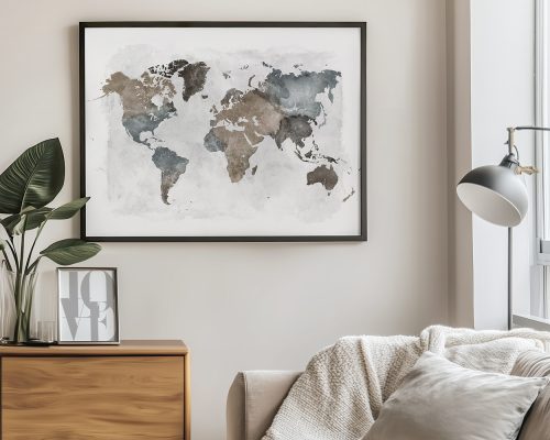 World map featuring earth tones with a watercolor effect, framed and displayed on a wall.