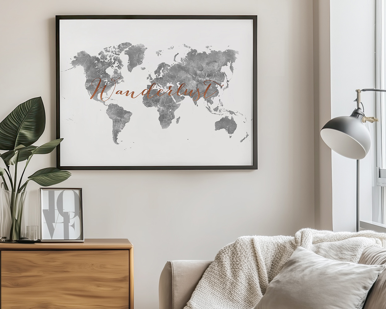Framed world map art print with a gray design and the word 'Wanderlust' in orange.