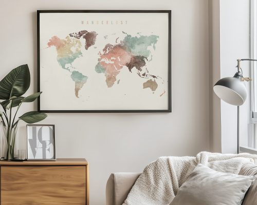 World map featuring watercolor-style countries in various colors, framed and displayed on a wall.
